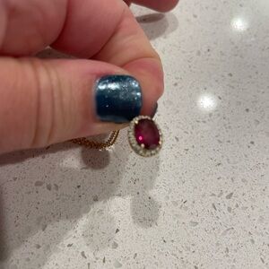 14k yellow gold chain with 14k gold red stone pendant